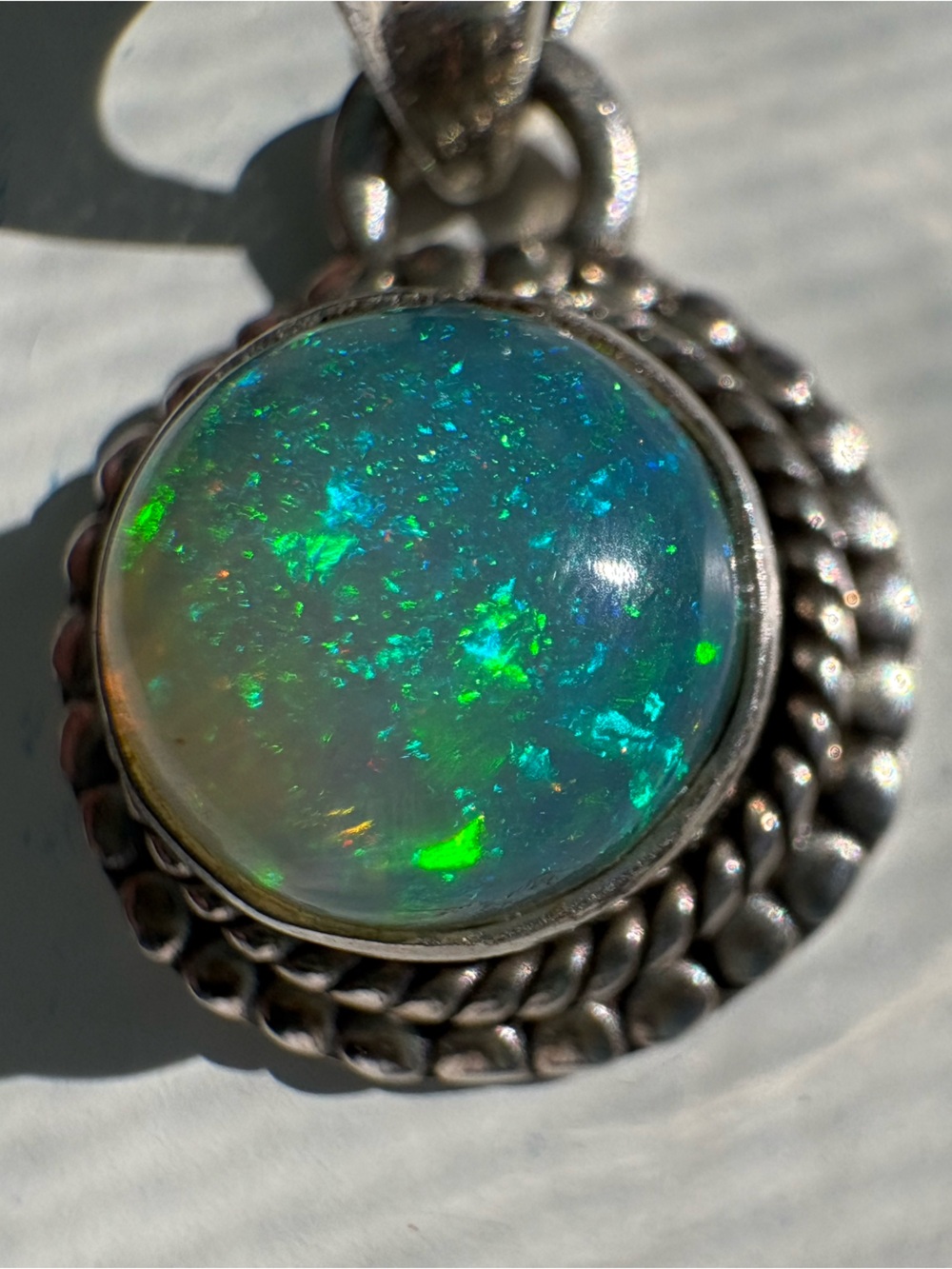 Sterling Opal Ethiopian Opal Pendant with extreme flash